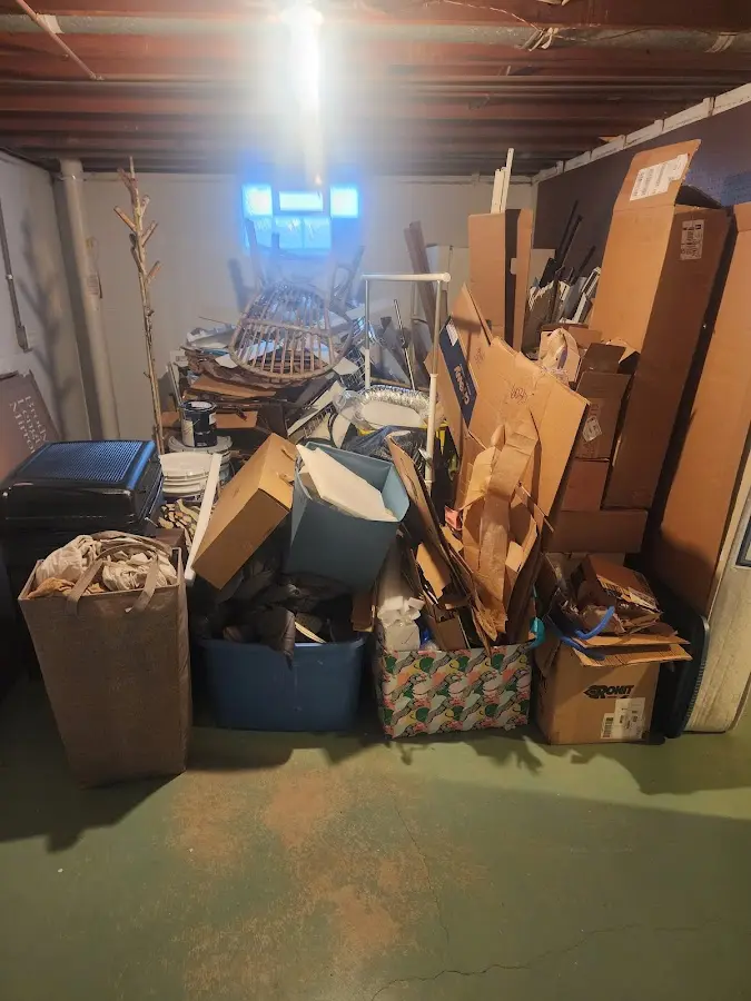 Roll-off dumpster container at job site for 2 Yard Dumpster Rental in Chesapeake Ranch Estates